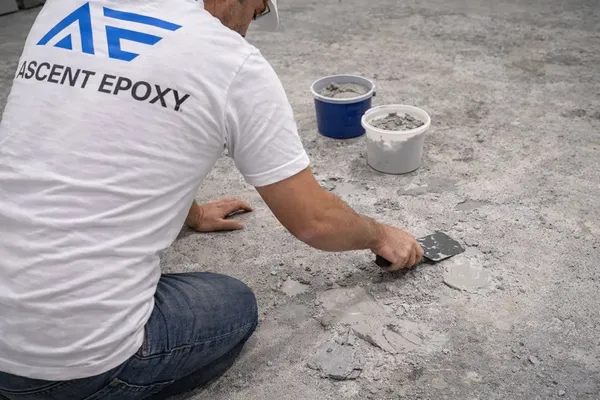 Grinding and preparing concrete after coating removal in Collier County