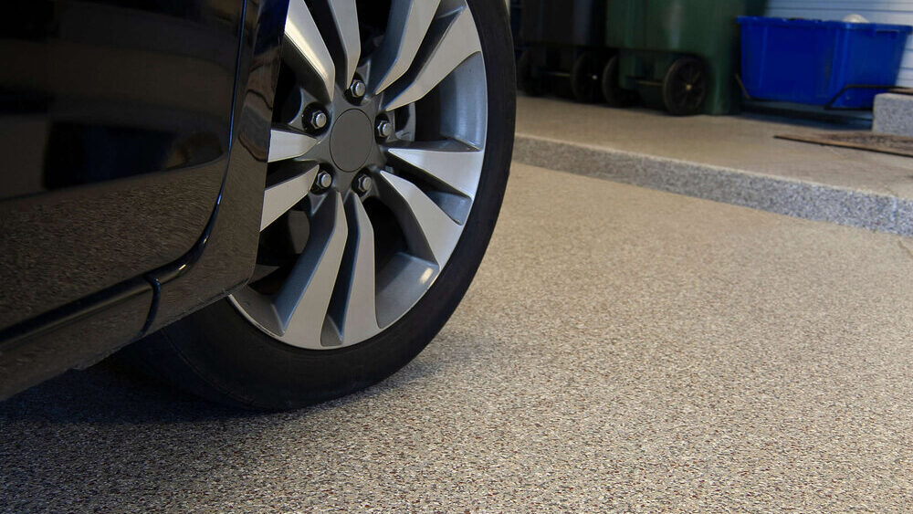 Flake+epoxy+garage+2 Epoxy flooring installation by Ascent Epoxy Naples showcasing elegant designs and high-quality finishes.