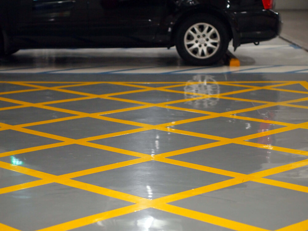 Solid+Epoxy+Garage Epoxy flooring project by Ascent Epoxy Naples, highlighting modern design and quality craftsmanship.