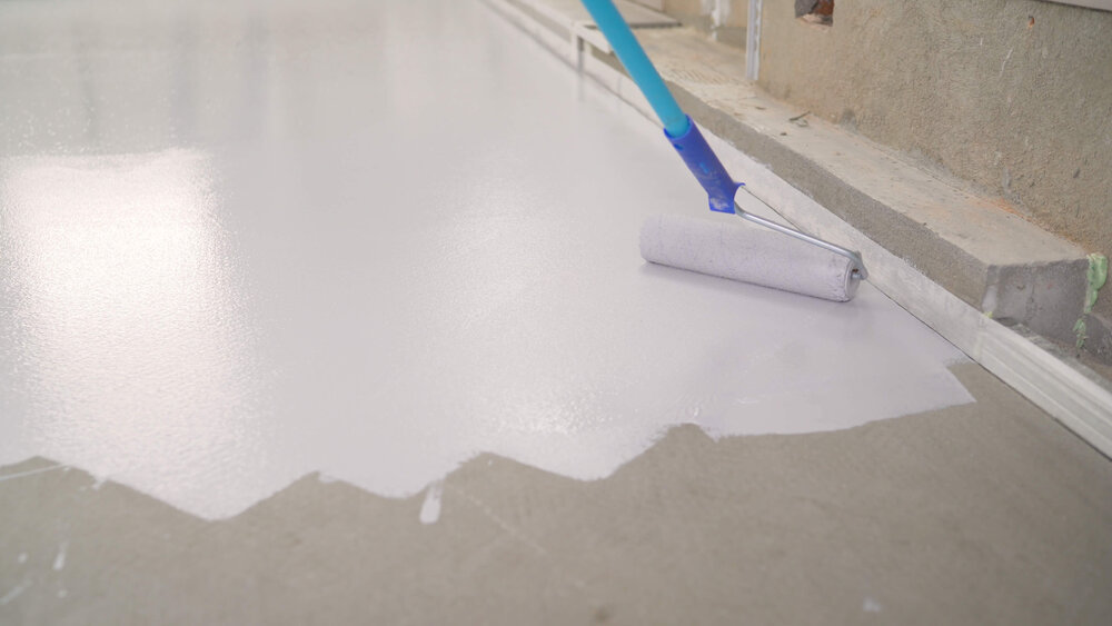 epoxy+basement Epoxy flooring installation by Ascent Epoxy Naples showcasing vibrant designs and smooth finishes in a residential space.